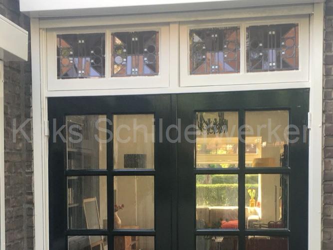 Schilder Breda, dubbele openslaande deuren met rolluik